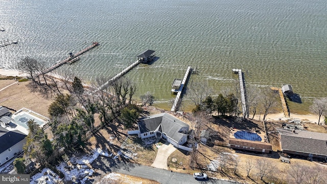 birds eye view of property featuring a water view