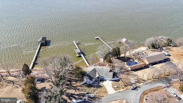 birds eye view of property featuring a water view