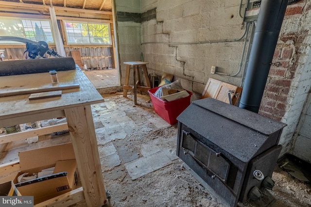 miscellaneous room featuring a wood stove