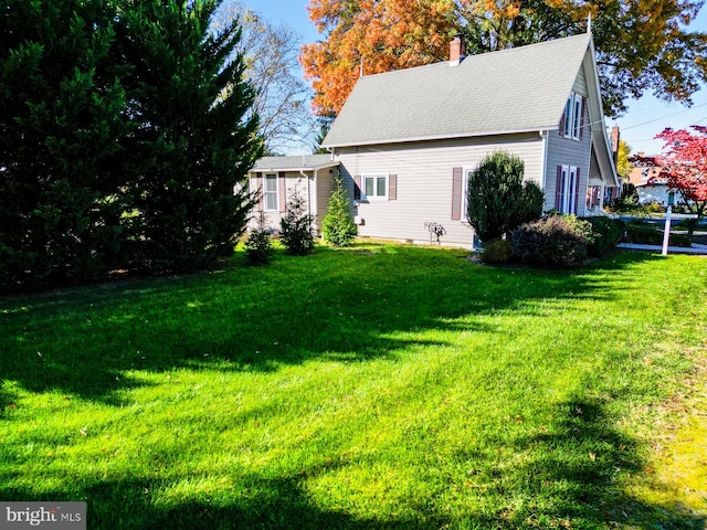 exterior space with a yard