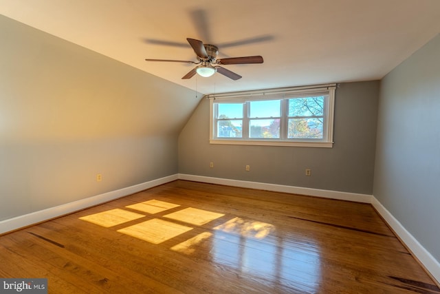 bonus room with lofted ceiling, wood-type flooring, and ceiling fan