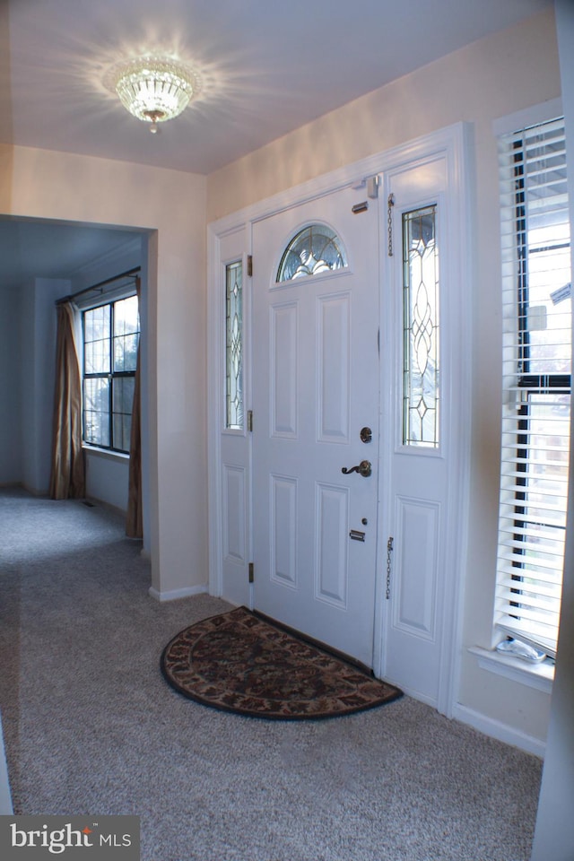 entryway featuring carpet