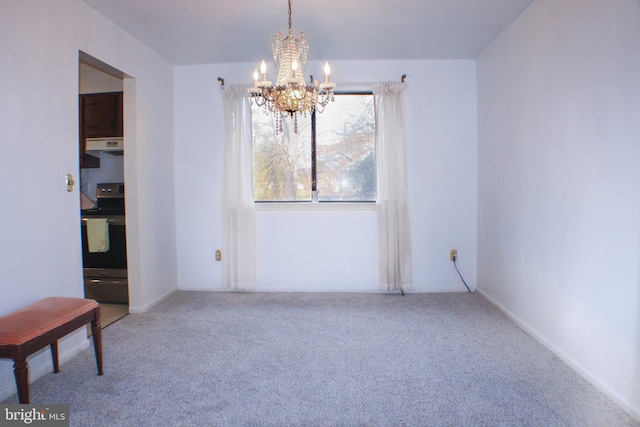 dining space with a chandelier and carpet flooring