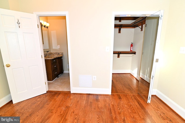 hall featuring hardwood / wood-style flooring