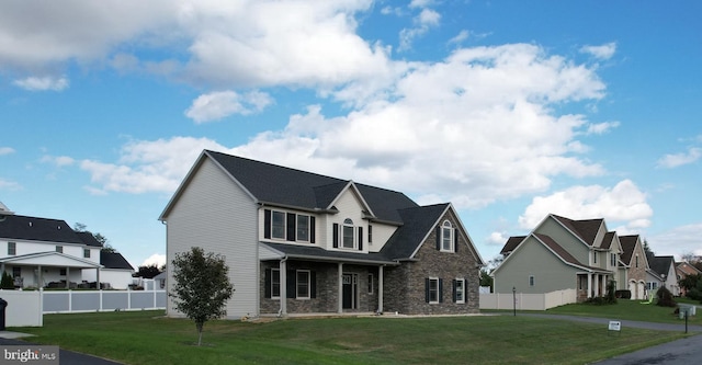 view of front facade featuring a front lawn