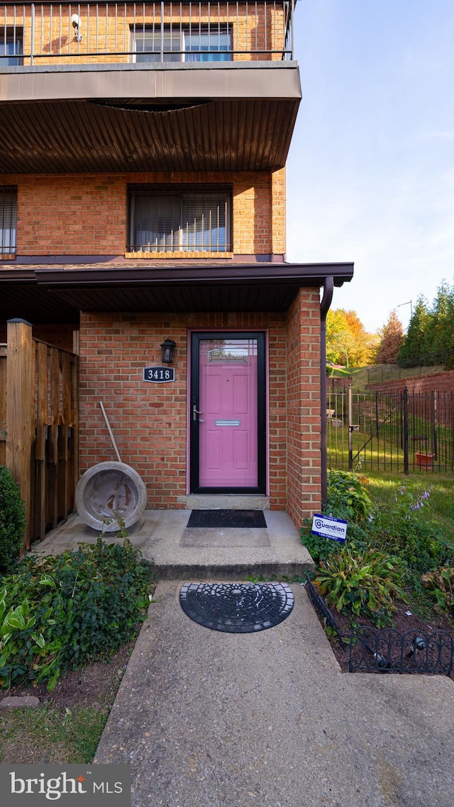 doorway to property featuring a balcony