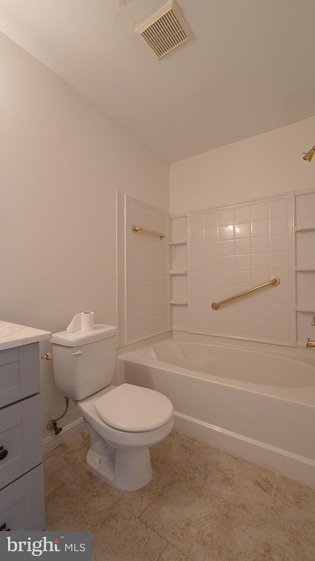 full bathroom featuring vanity, toilet, tile patterned floors, and washtub / shower combination