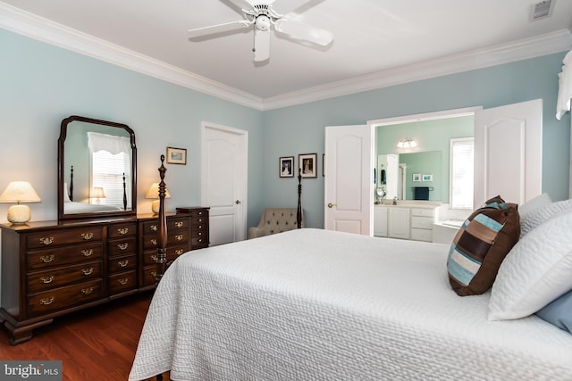 bedroom featuring dark wood-type flooring, ensuite bathroom, ceiling fan, and ornamental molding