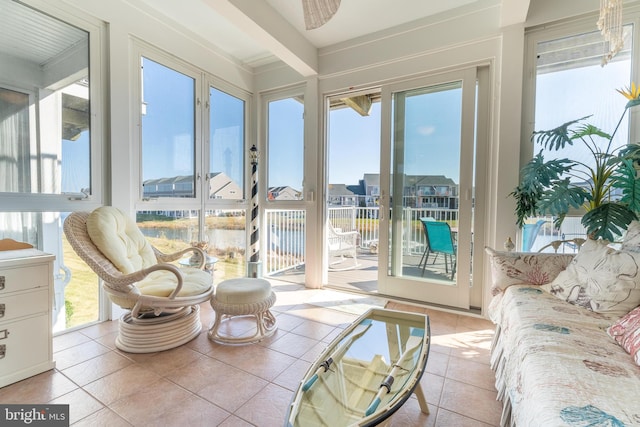 sunroom / solarium with beamed ceiling