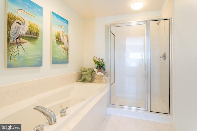 bathroom featuring shower with separate bathtub and tile patterned floors