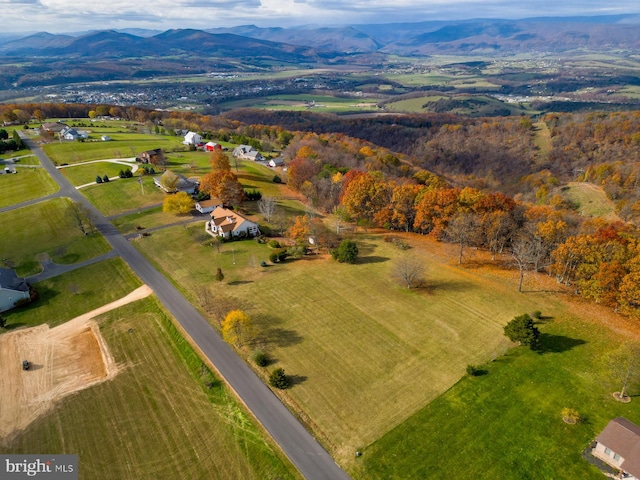 bird's eye view featuring a mountain view and a rural view