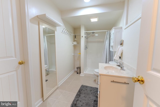 bathroom featuring a shower, vanity, and toilet