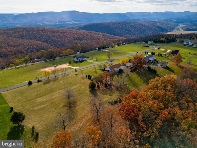 aerial view featuring a mountain view and a rural view