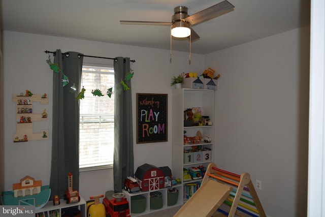 game room with ceiling fan and a wealth of natural light