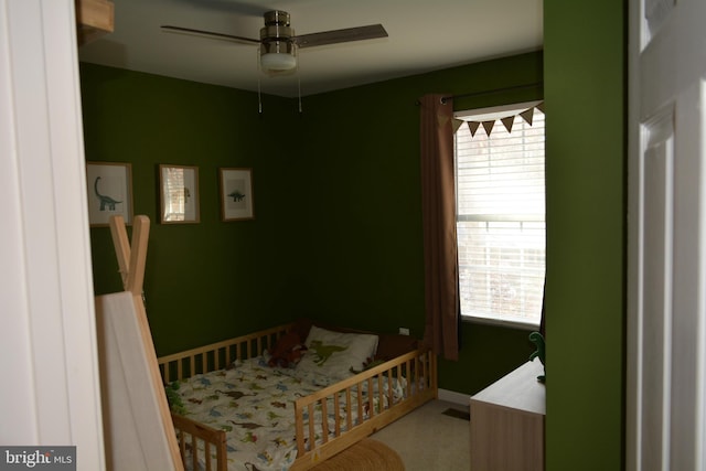 carpeted bedroom with ceiling fan