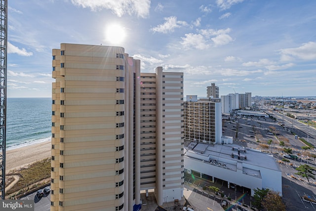 property's view of city with a water view and a view of the beach