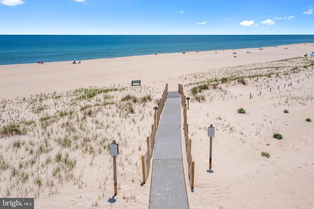 property view of water featuring a beach view