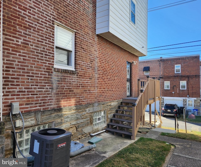 property entrance featuring cooling unit