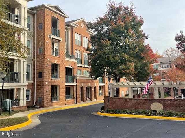 view of property featuring central AC unit