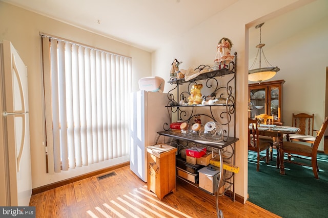 interior space with hardwood / wood-style floors