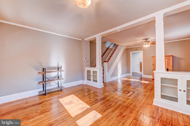 unfurnished living room featuring ceiling fan, light hardwood / wood-style flooring, and crown molding