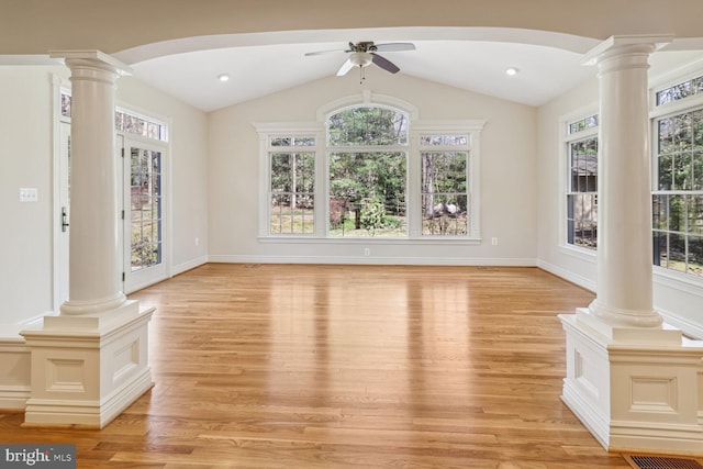 unfurnished living room featuring ceiling fan, light wood-type flooring, and vaulted ceiling