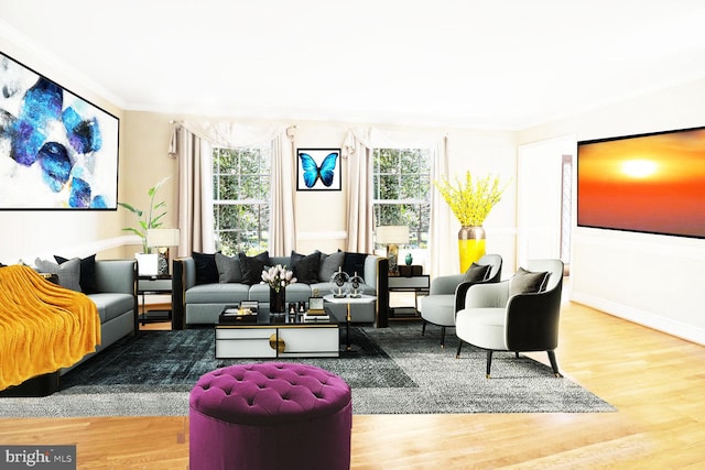 living room featuring a healthy amount of sunlight, wood-type flooring, and ornamental molding