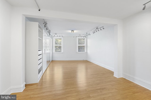 unfurnished room with light hardwood / wood-style flooring