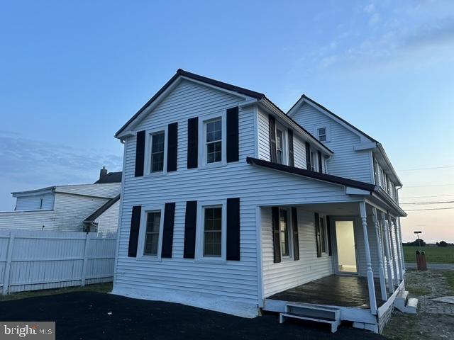 view of property exterior at dusk