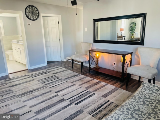 sitting room featuring ceiling fan and hardwood / wood-style flooring