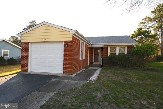 ranch-style house with a front lawn and a garage