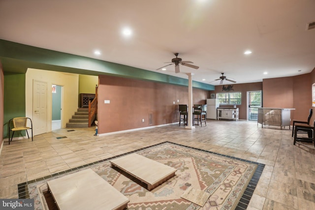 living room with ceiling fan