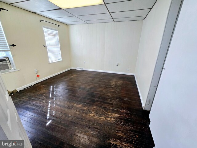 32 S F St, Keyser, WV 26726 - empty room featuring hardwood / wood-style flooring, baseboards, and a drop ceiling