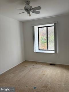 spare room with light colored carpet