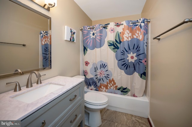 full bathroom featuring vanity, toilet, and shower / bathtub combination with curtain