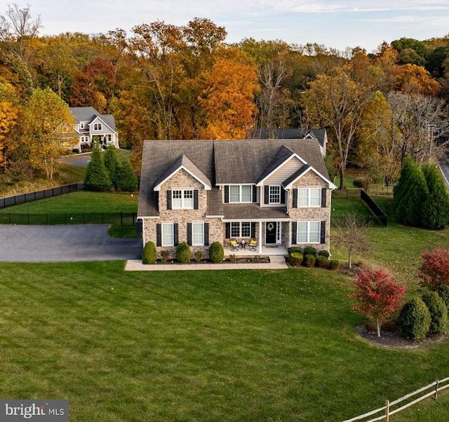 view of front of property with a front lawn