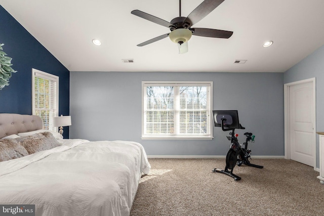 bedroom featuring carpet floors, ceiling fan, and lofted ceiling