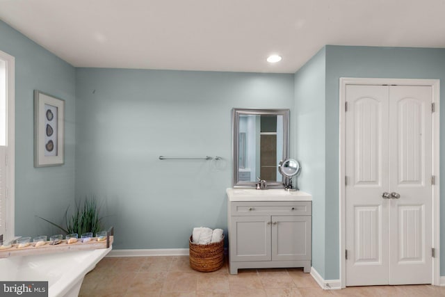 bathroom with vanity and tile patterned floors