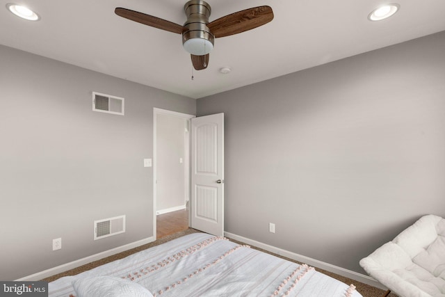 carpeted bedroom with ceiling fan