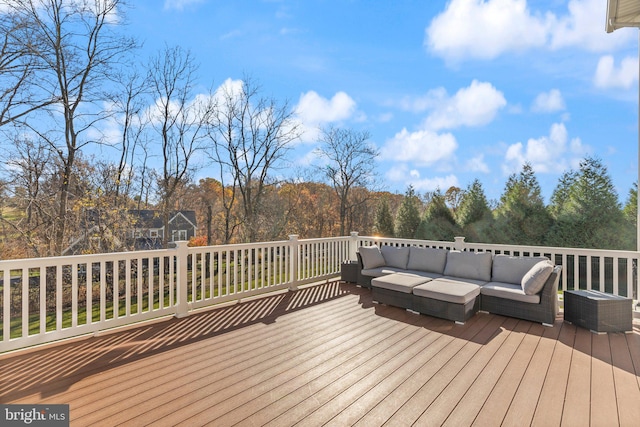 deck featuring outdoor lounge area