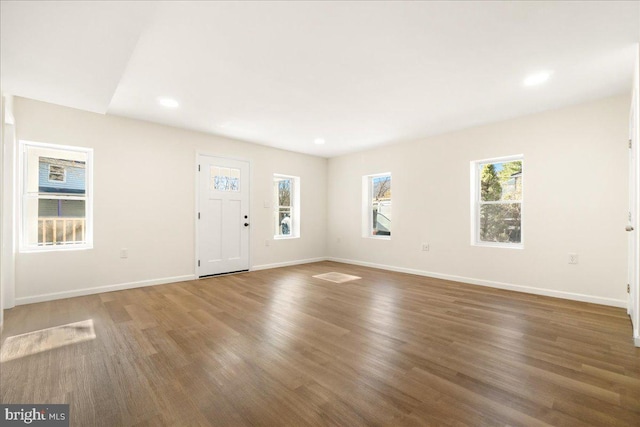 245 Knoxville Rd, Knoxville, MD 21758 - unfurnished living room featuring wood finished floors, baseboards, and recessed lighting