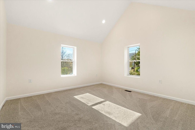 245 Knoxville Rd, Knoxville, MD 21758 - empty room featuring carpet floors, plenty of natural light, baseboards, high vaulted ceiling, and recessed lighting