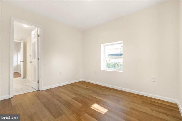 empty room featuring light hardwood / wood-style floors