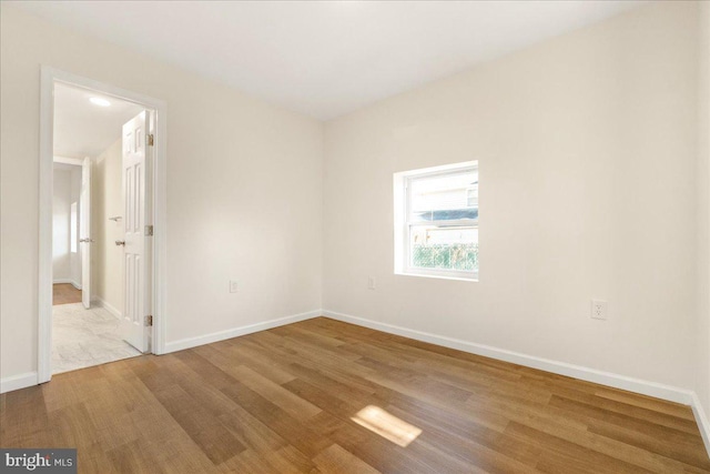 245 Knoxville Rd, Knoxville, MD 21758 - spare room featuring wood finished floors and baseboards