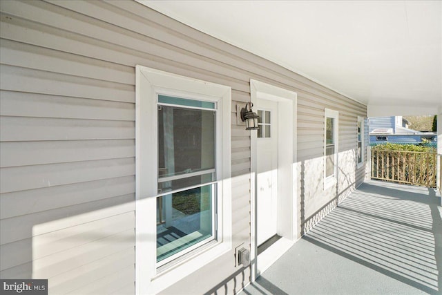 balcony featuring a porch