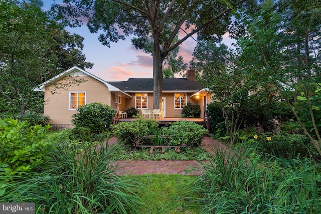 ranch-style house with a deck