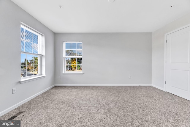 view of carpeted spare room