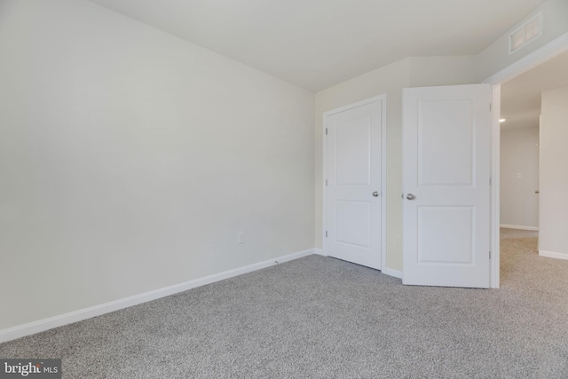 unfurnished bedroom with carpet floors