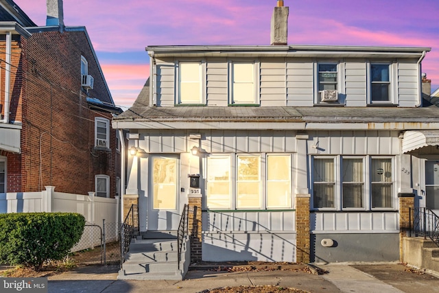 227 Columbus Ave, Trenton, NJ 08629 - view of front facade with entry steps, fence, and board and batten siding