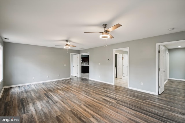 unfurnished room featuring wood-type flooring and ceiling fan